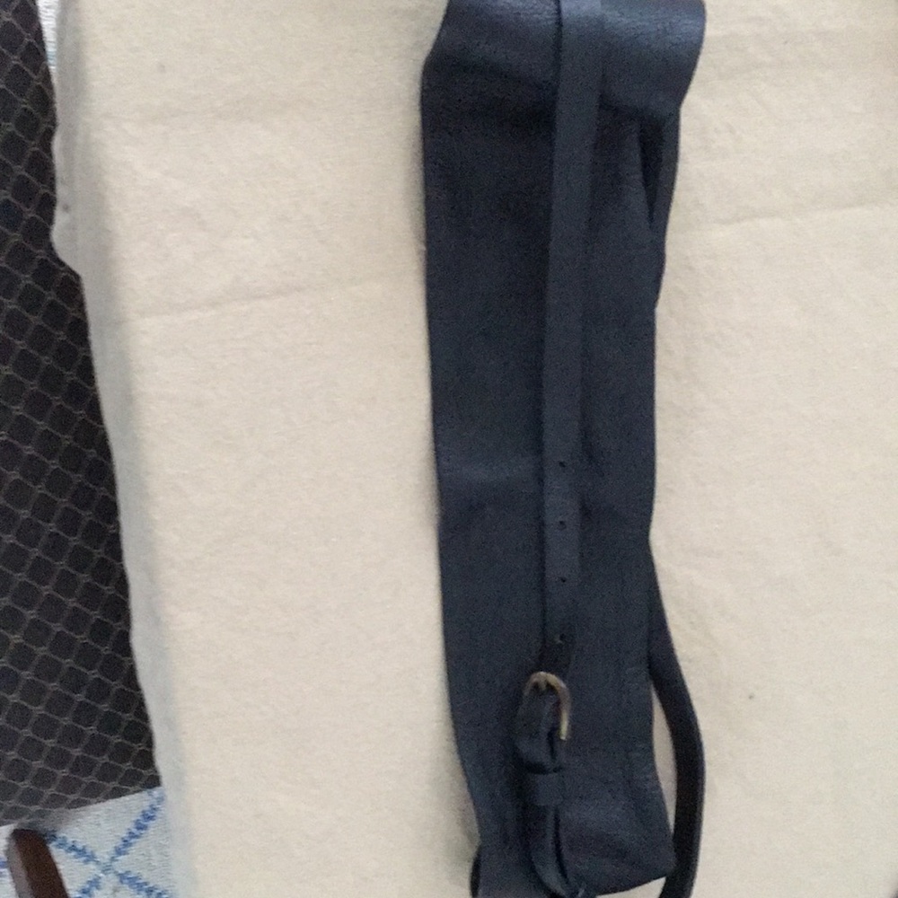 Black leather belt with buckle